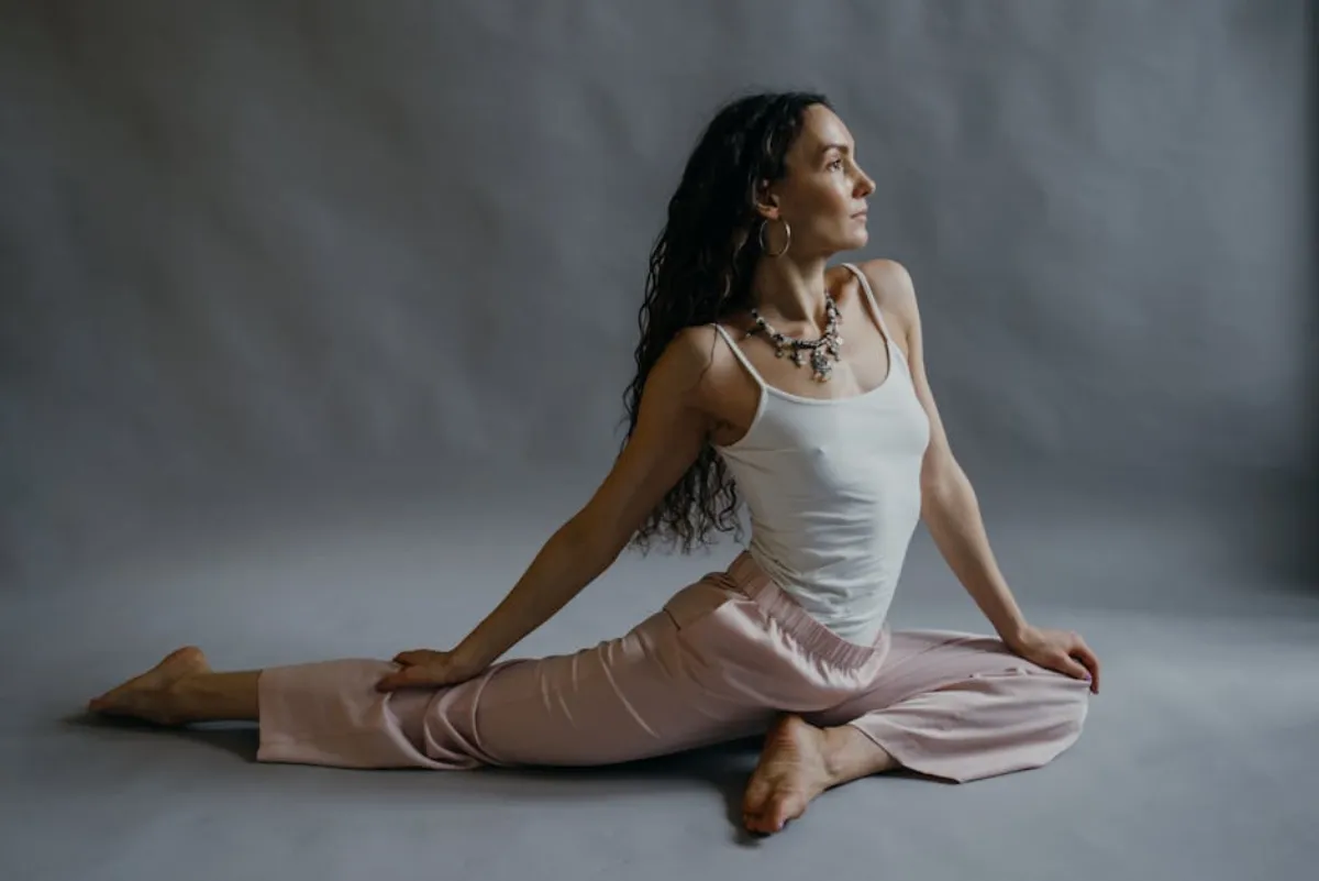 Woman practicing yoga in a peaceful studio